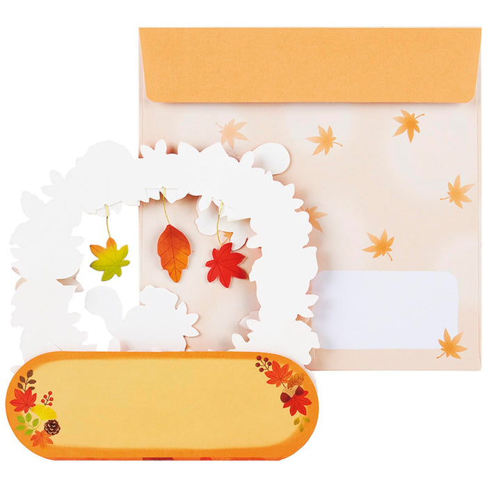 Carte de vœux Sanrio Autumn Squirrel avec arche de feuilles - Livraison à l'étranger disponible