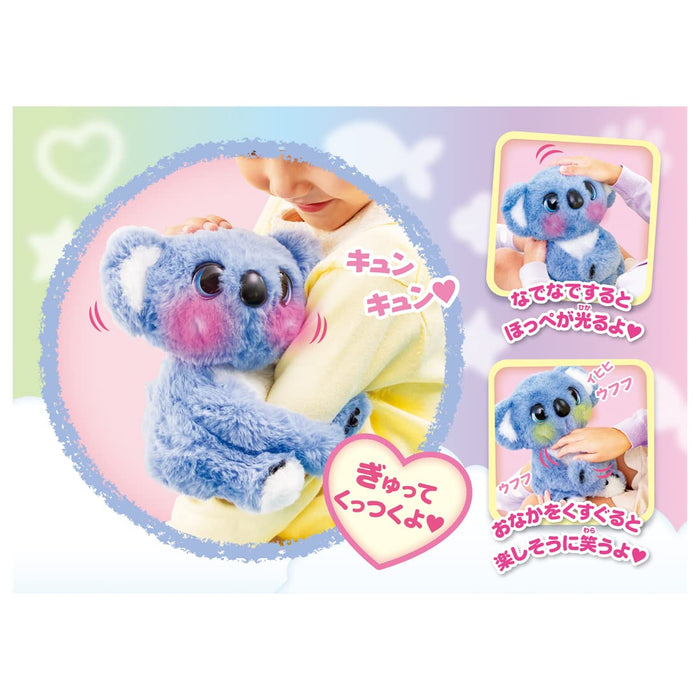 Peluche Koala câline et choyée de Takara Tomy Hug Me Tightly