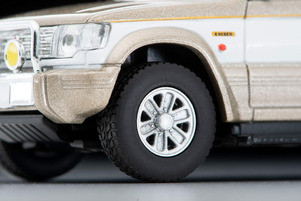 Tomytec Tomica Vintage Neo Mitsubishi Pajero Mid Roof Wide Super Exceed 91 1/64 Beige/White